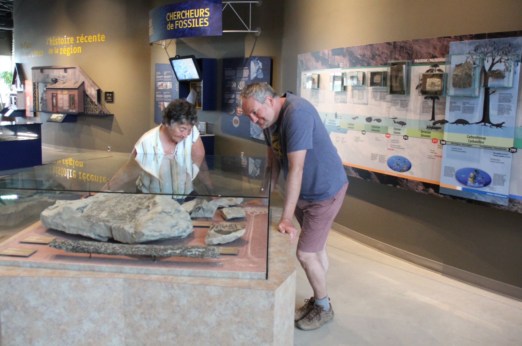 Darryl and Sandra looking at a fossil in the museum
